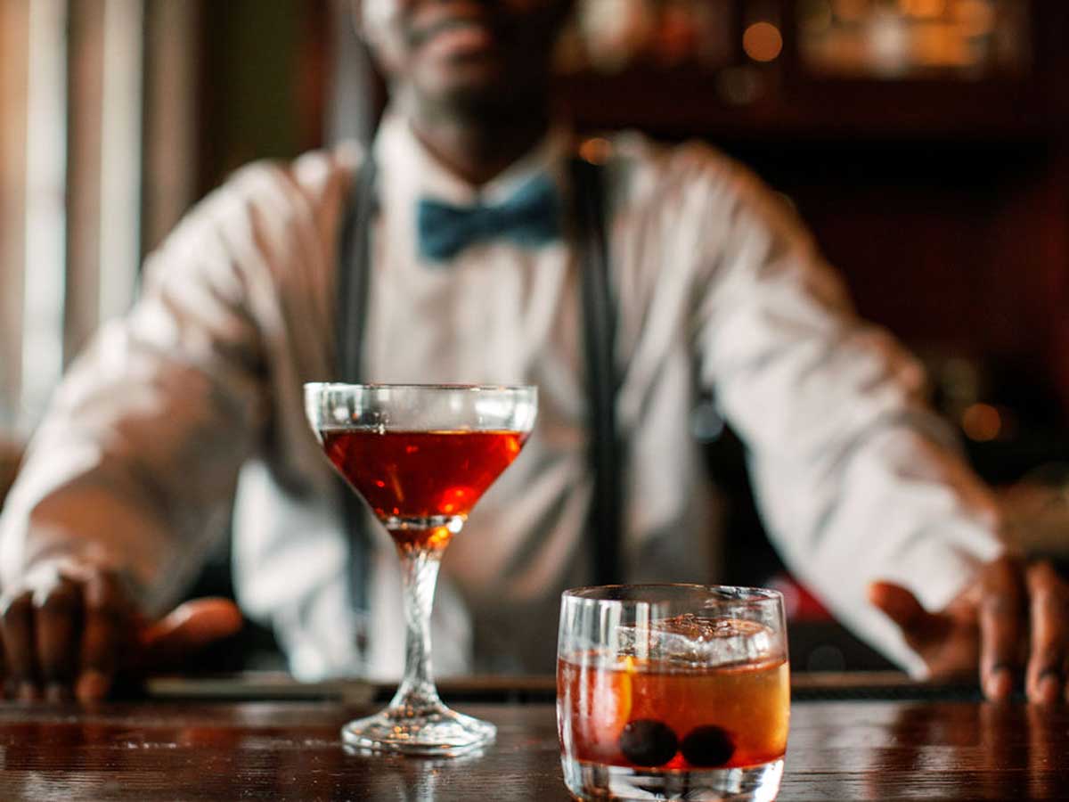 barman with drinks