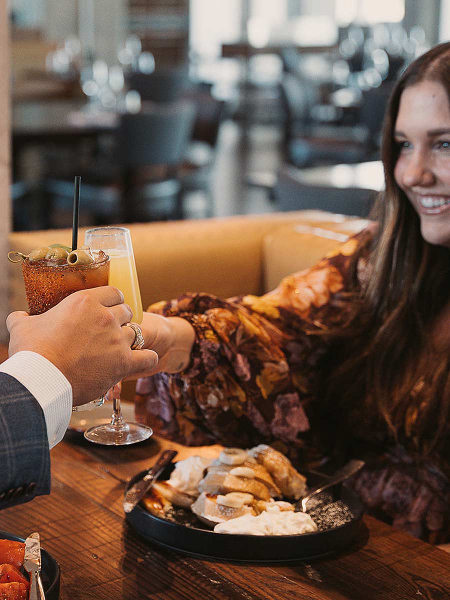 Couple Toasting With Cocktails.
